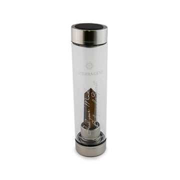 Leo Laterra Gemstone Water Bottle with tiger eye crystal attachment inside clear glass bottle on white background.